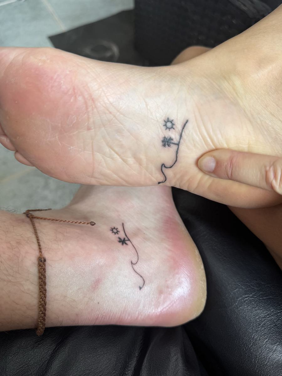 Matching tattoos in Coron — Coron